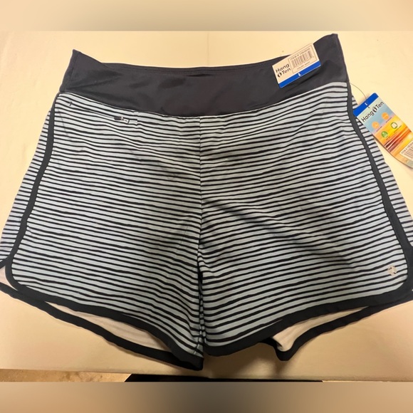 HANG TEN MENS SWIM TRUNKS. SIZE LARGE. 
LIGHT AND DARK BLUE STRIPES. - Picture 1 of 12